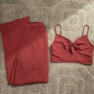 2 piece set. Bottoms are pants & a crop top